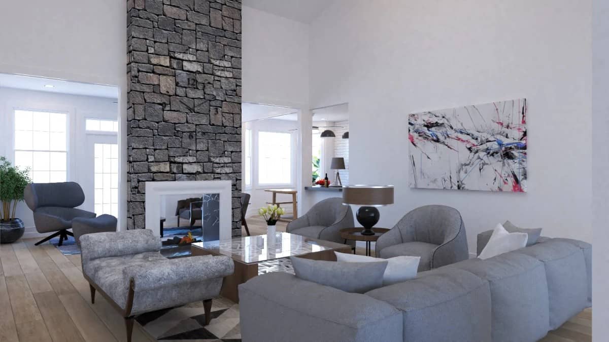家庭娱乐室设有灰色座椅和安装在石柱上的双面壁炉。
