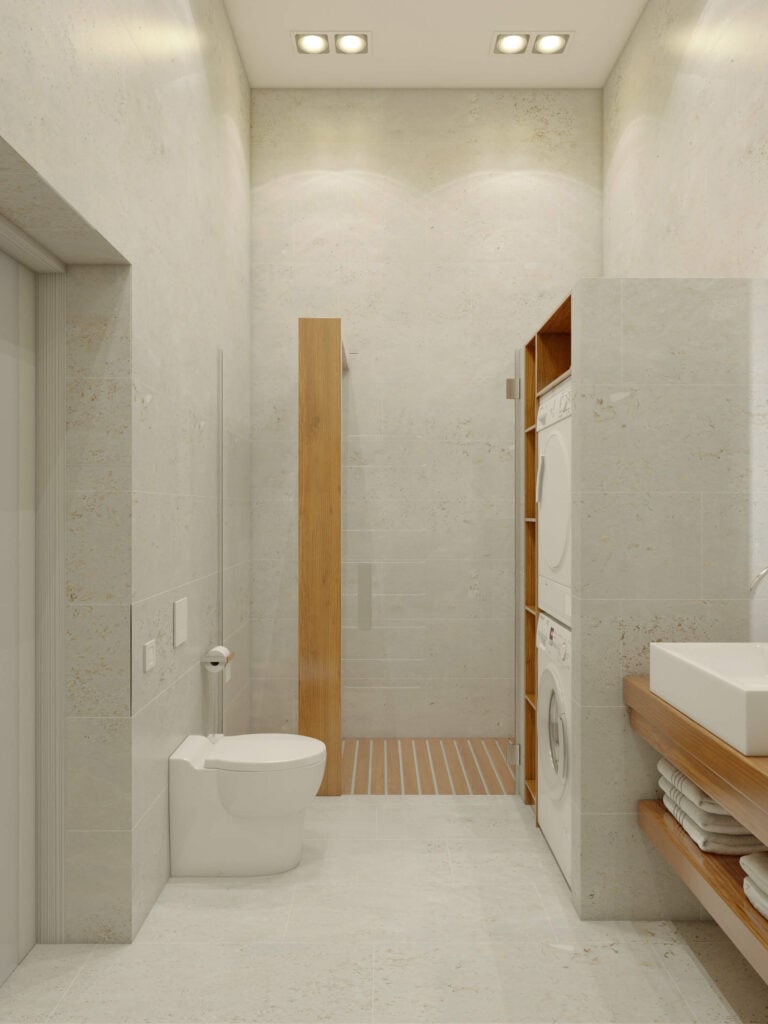 第二间浴室设有巨大的步入式淋浴和洗衣设施。