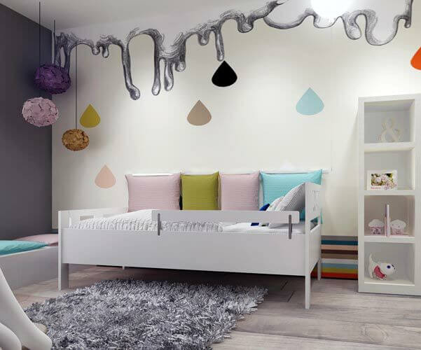 这个色彩丰富，但又有些安静的十几岁女孩的房间在床后的墙上有一幅定制的壁画，就像一朵融化的云把彩色的雨滴滴到墙底部的彩虹边界上。沙发床是纯白色的，靠在深色墙壁上的矮长凳。