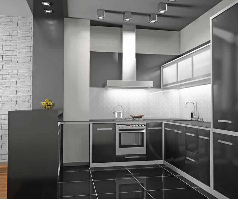 这个金属风格的厨房既别致又现代。橱柜下的灯光照亮了光滑的表面和金属的口音。