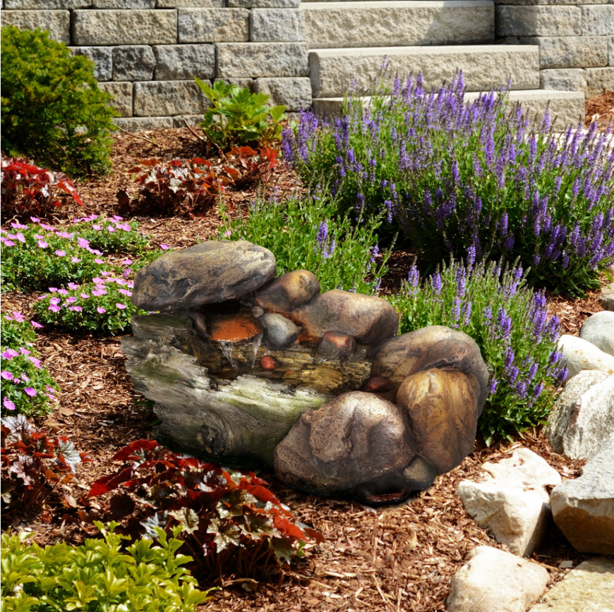 一块小小的石头可以为花园增色不少。这个小石头喷泉带来的吸引力，石头可以增加你的花园，而不占用太多空间。