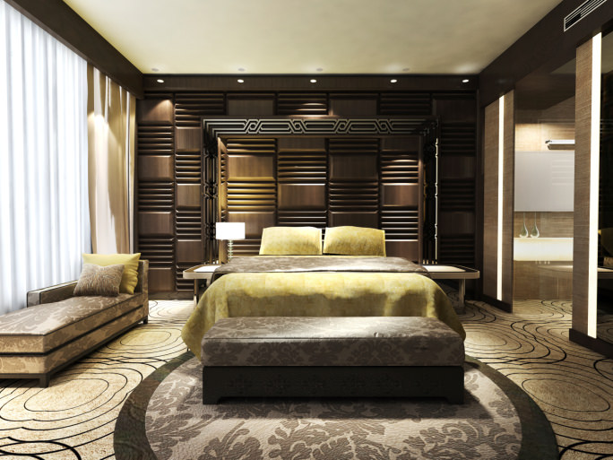 这间主卧室拥有时尚的地毯地板和墙壁以及豪华的床。