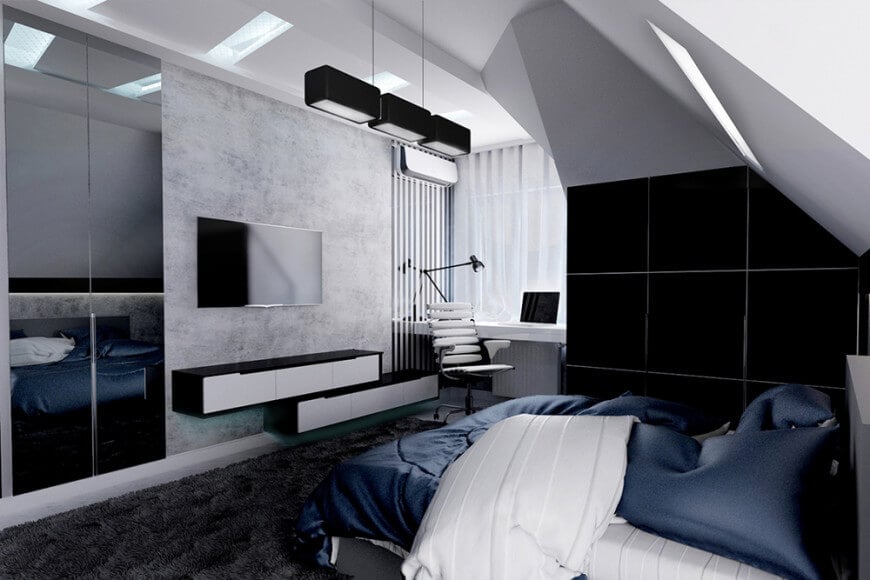 这间主卧室拥有一张舒适的床，面对着安装在浮动架子上方的电视。它包括现代的黑色吊坠和一张光滑的白色桌子，搭配一张时尚的转椅。