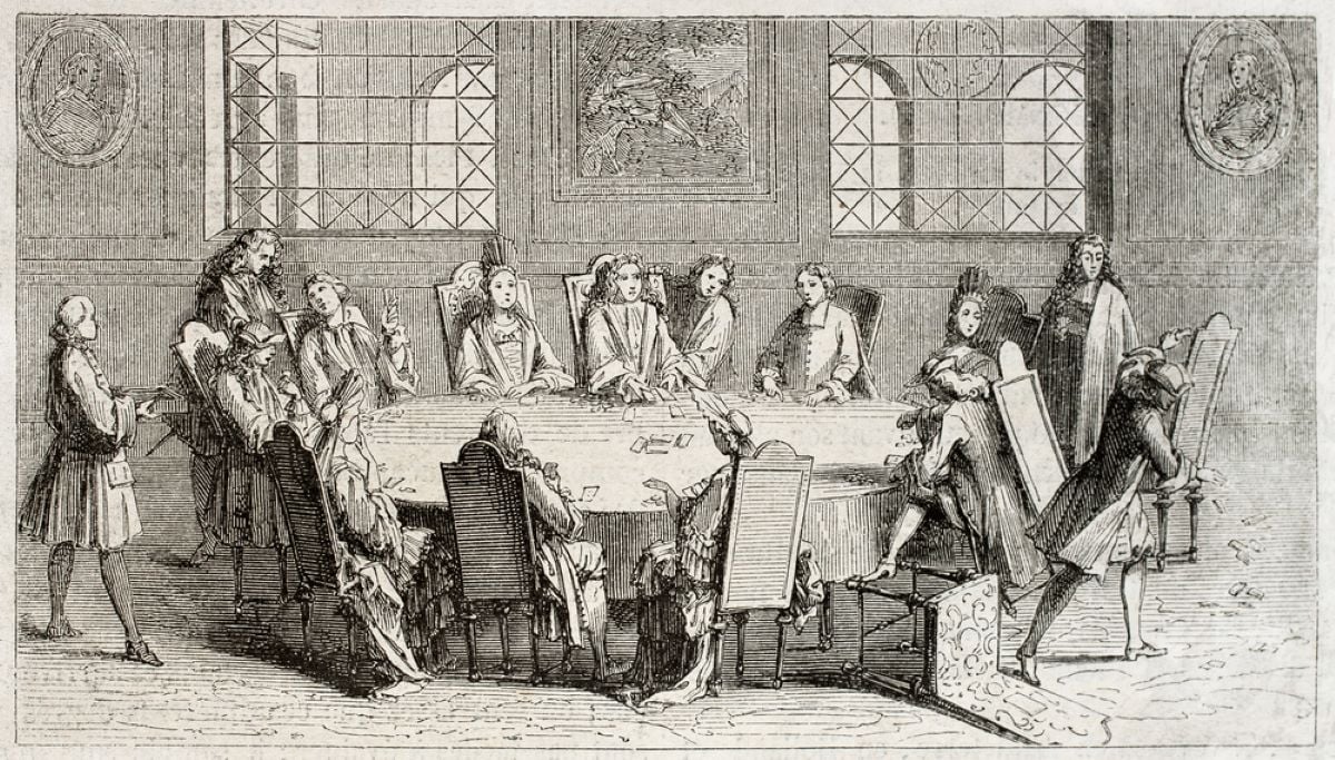 Sébastien勒克莱尔蚀刻画描绘了1708年法国一群人围着桌子打牌。