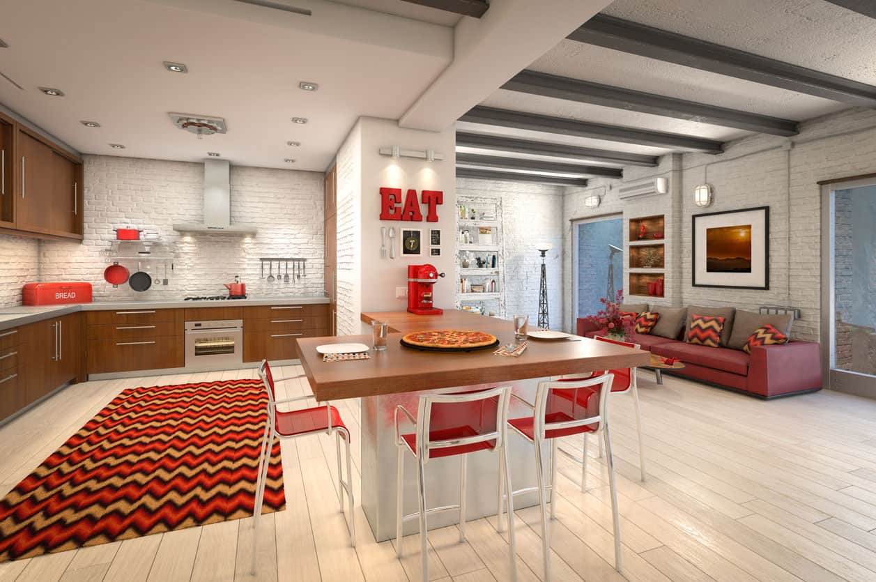 红色厨房没有红色橱柜的例子。这个例子有一些红色的飞溅，如红色岛凳，红色小家电，红色装饰元素，红色地毯和红色沙发。