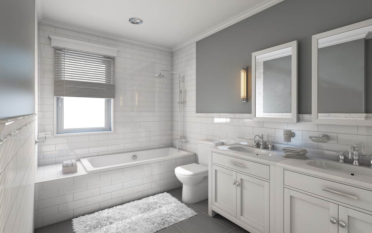 内衬灰色瓷砖和墙壁，这个白色瓷砖的感觉，主要的浴室是放松但现代。拉丝的银色固定装置增添了一种奢华的感觉，将所有的一切都联系在一起。
