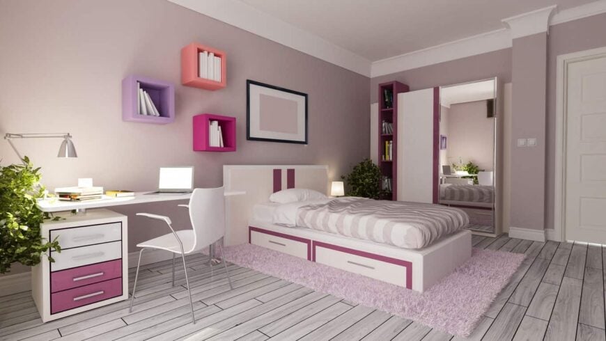 一个非常时尚的女孩卧室，有时尚的硬木地板，现代的床和电脑桌，以及墙壁和装饰。