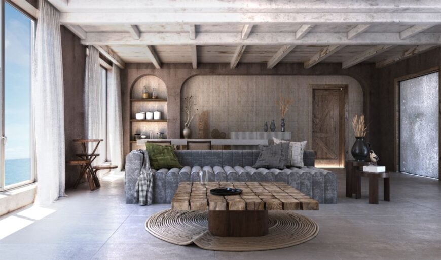 非常酷的工业风格的客厅，水泥地板和灰色组合沙发