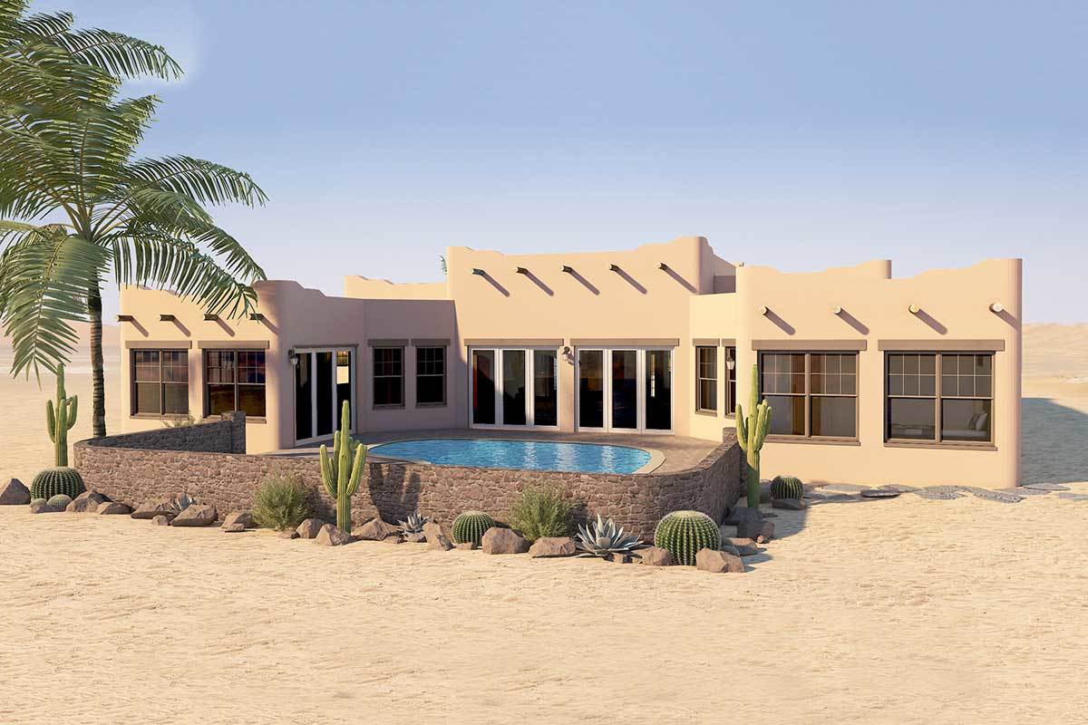 后方的外景是一个后院游泳池，由石头挡土墙和沙漠植物组成。