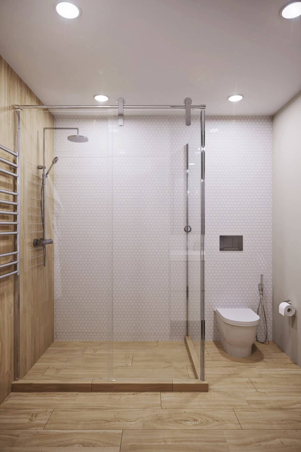 这张浴室视图展示了更多的玻璃封闭的淋浴区和旁边的浴室。