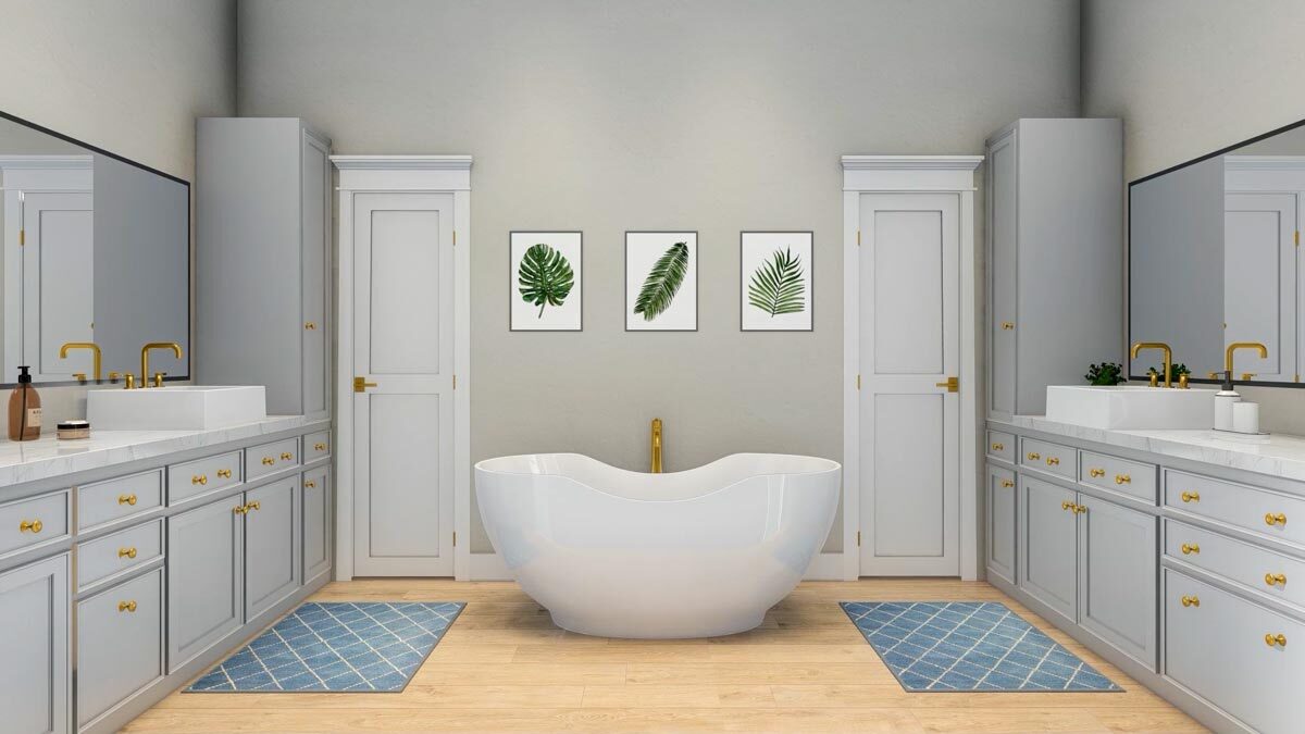 主浴室的特点是一个独立的浴缸，两侧是他和她的水槽梳妆台以及蓝色图案的地毯。