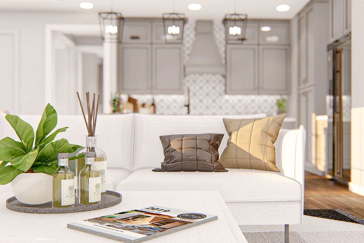 客厅配有白色组合家具和配套的茶几。