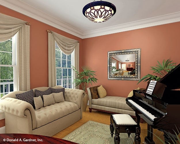 切斯特菲尔德的客厅家具沙发,沙发板凳,婴儿三角钢琴。
