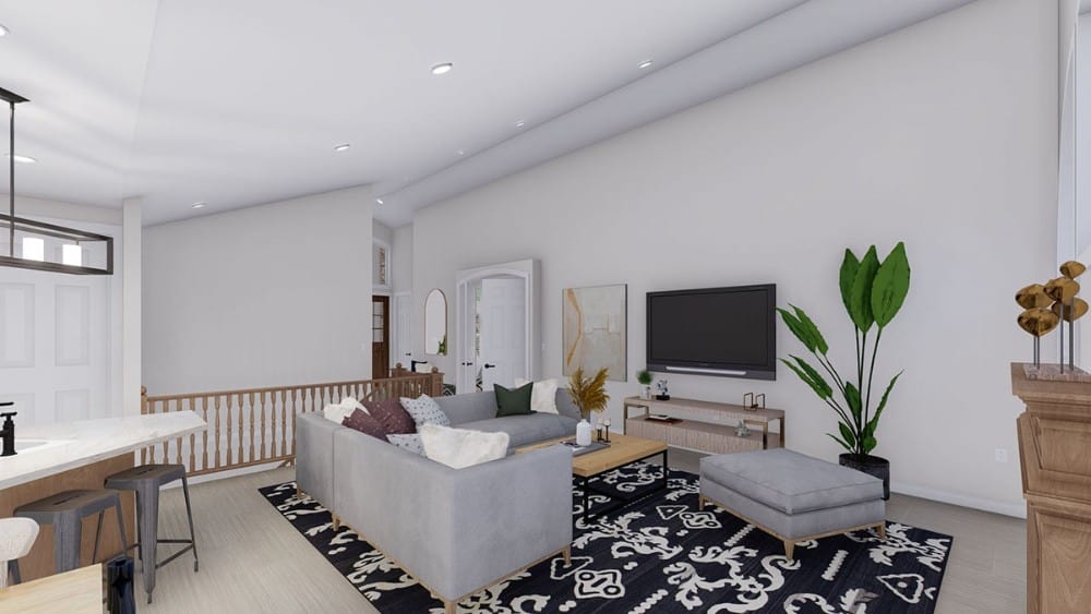 家庭娱乐室，有壁挂式电视，木桌，灰色座椅，上面有大图案地毯。
