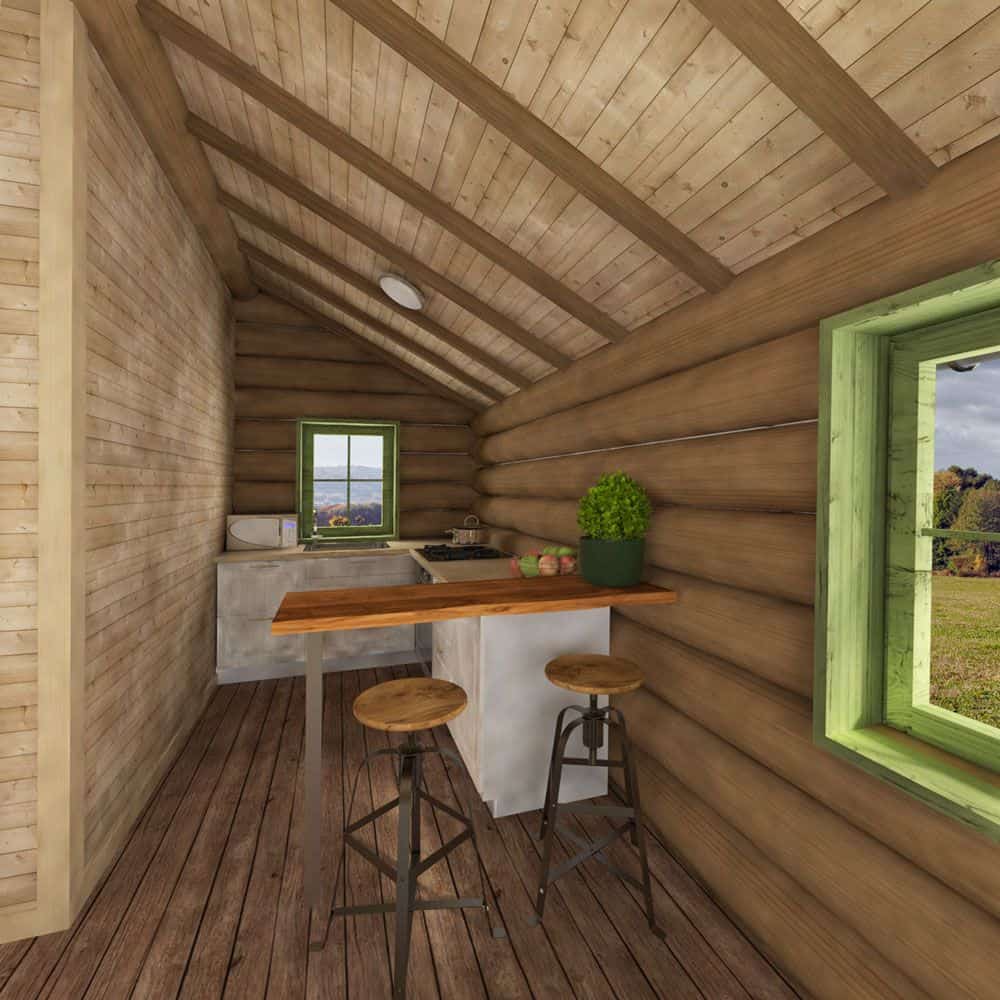 厨房里有一个l形的柜台和一个木面半岛，并配有圆形吧台凳。