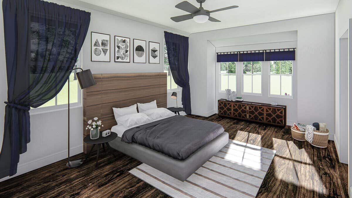 主卧室带有盒式凸窗和舒适的平台床，配有定制床头板。