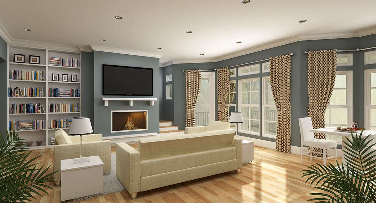 客厅里有米色座椅、嵌壁式书架和一面墙的窗户，可以让自然光照进来。