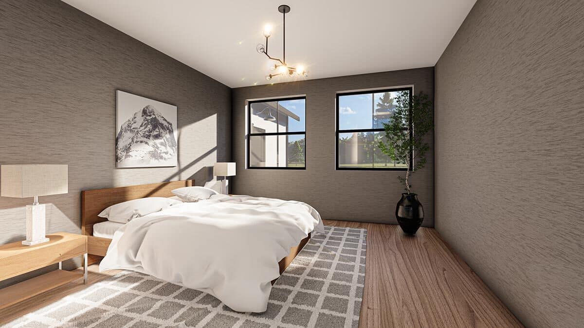 主卧室有漂亮的灰色墙壁和硬木地板，上面铺着方格地毯。