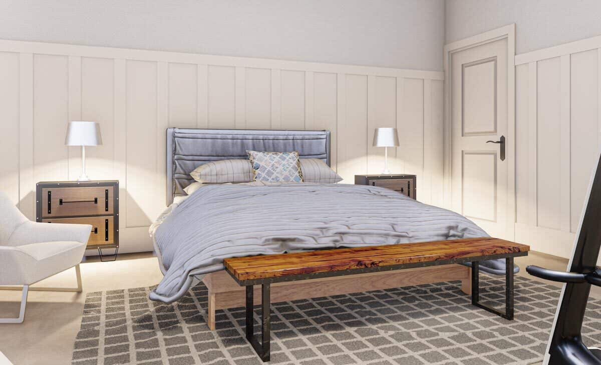 主卧室有一半beadboard墙壁和一个木制的床上辅以乡下的长凳上。