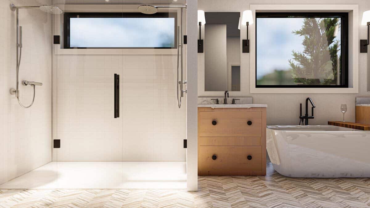 一个宽敞的浏览淋浴和两个莲蓬头完成主浴室。