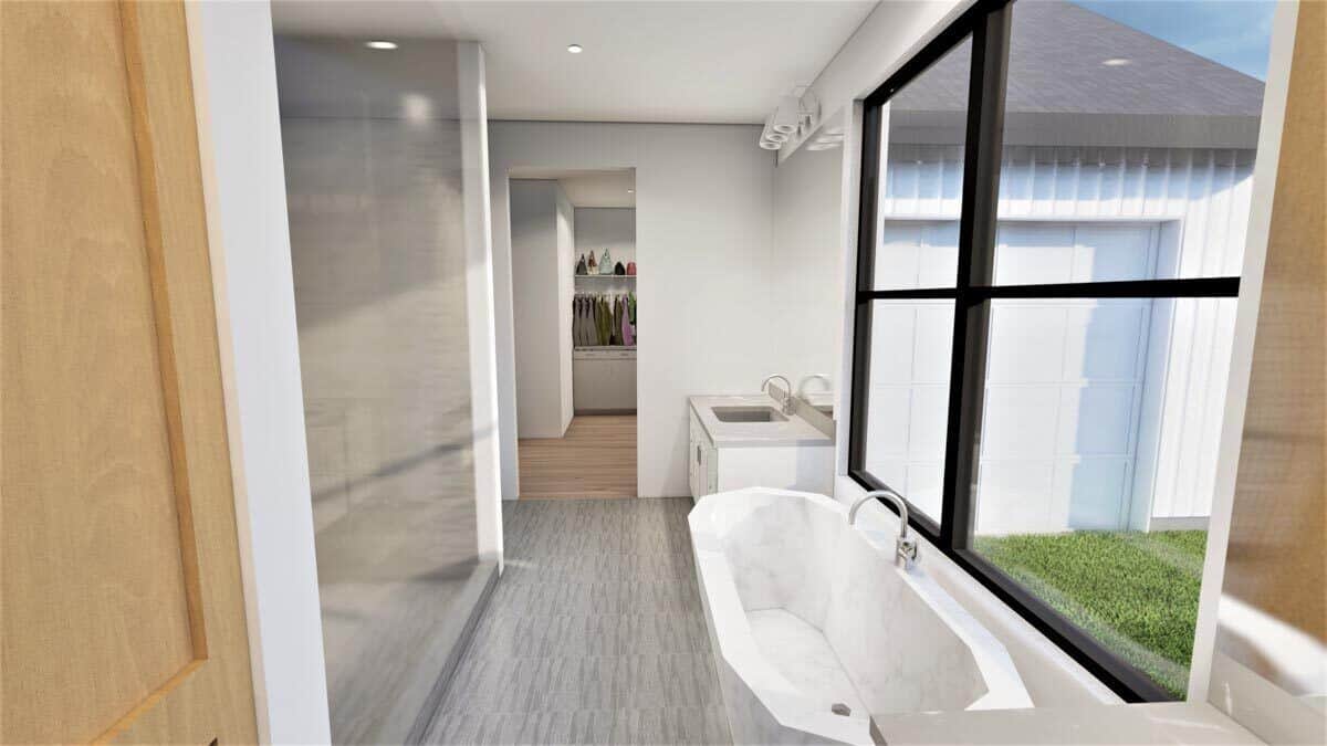 主浴室有一个淋浴区,一个大壁橱,独立式浴缸后院的风景。