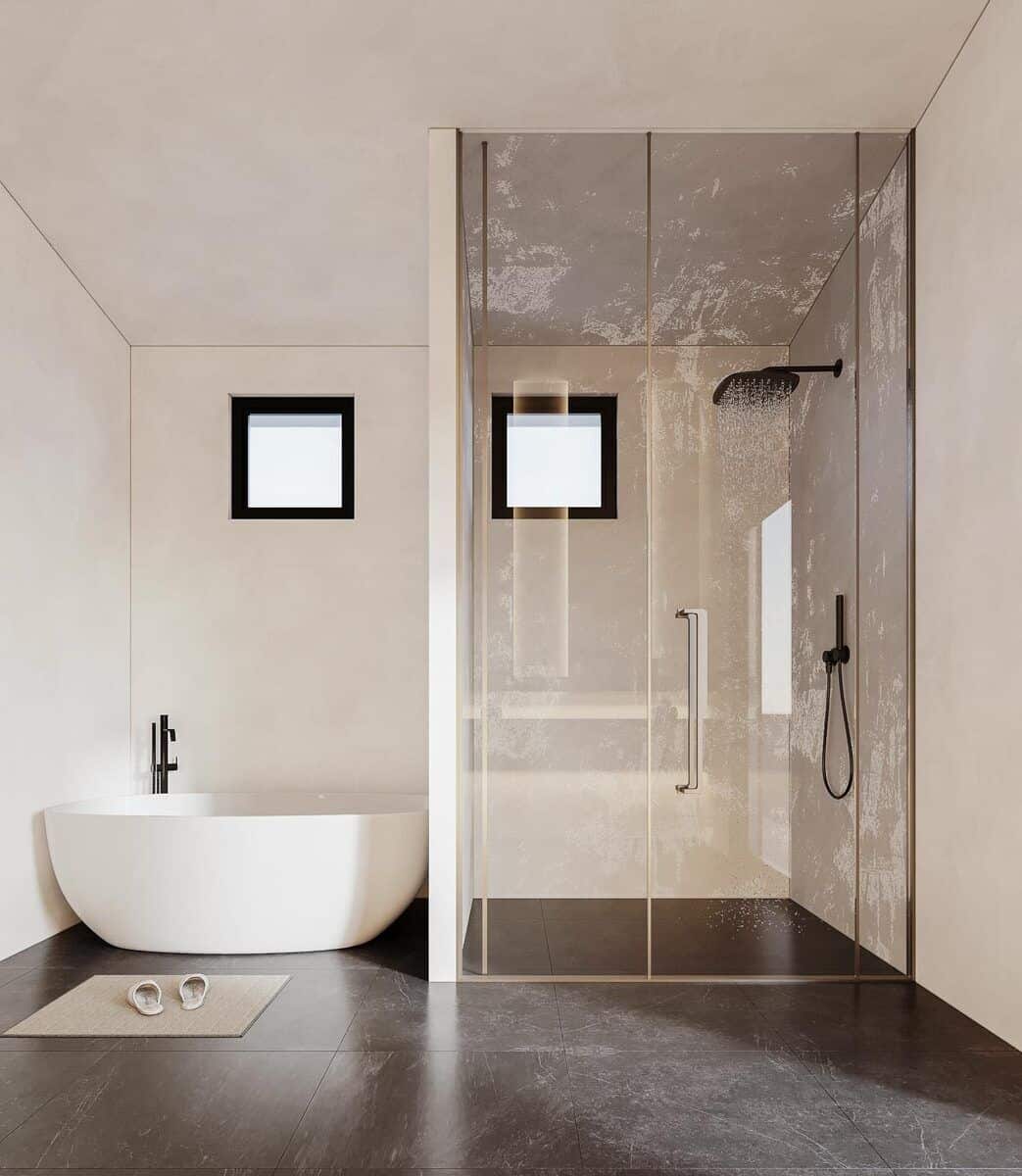 主浴室配备了一个独立的浴缸和一个配有锻铁固定装置的步入式淋浴间。