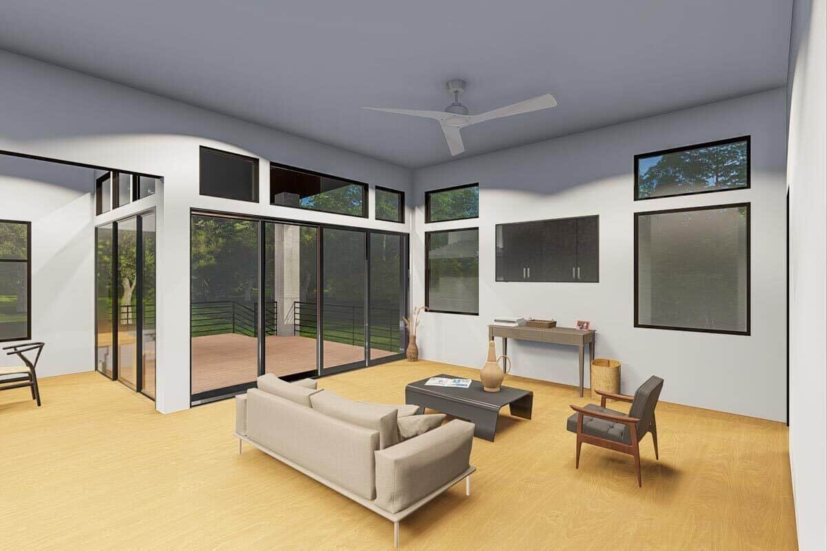宽敞的房间，现代化的座位，光滑的窗户，和滑动玻璃门，打开覆盖的甲板。