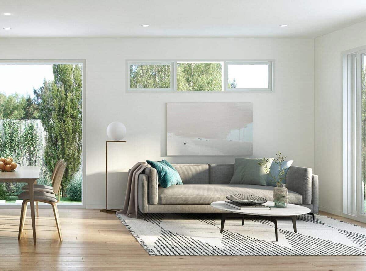 天窗windows和极简主义艺术作品上灰色的沙发上。