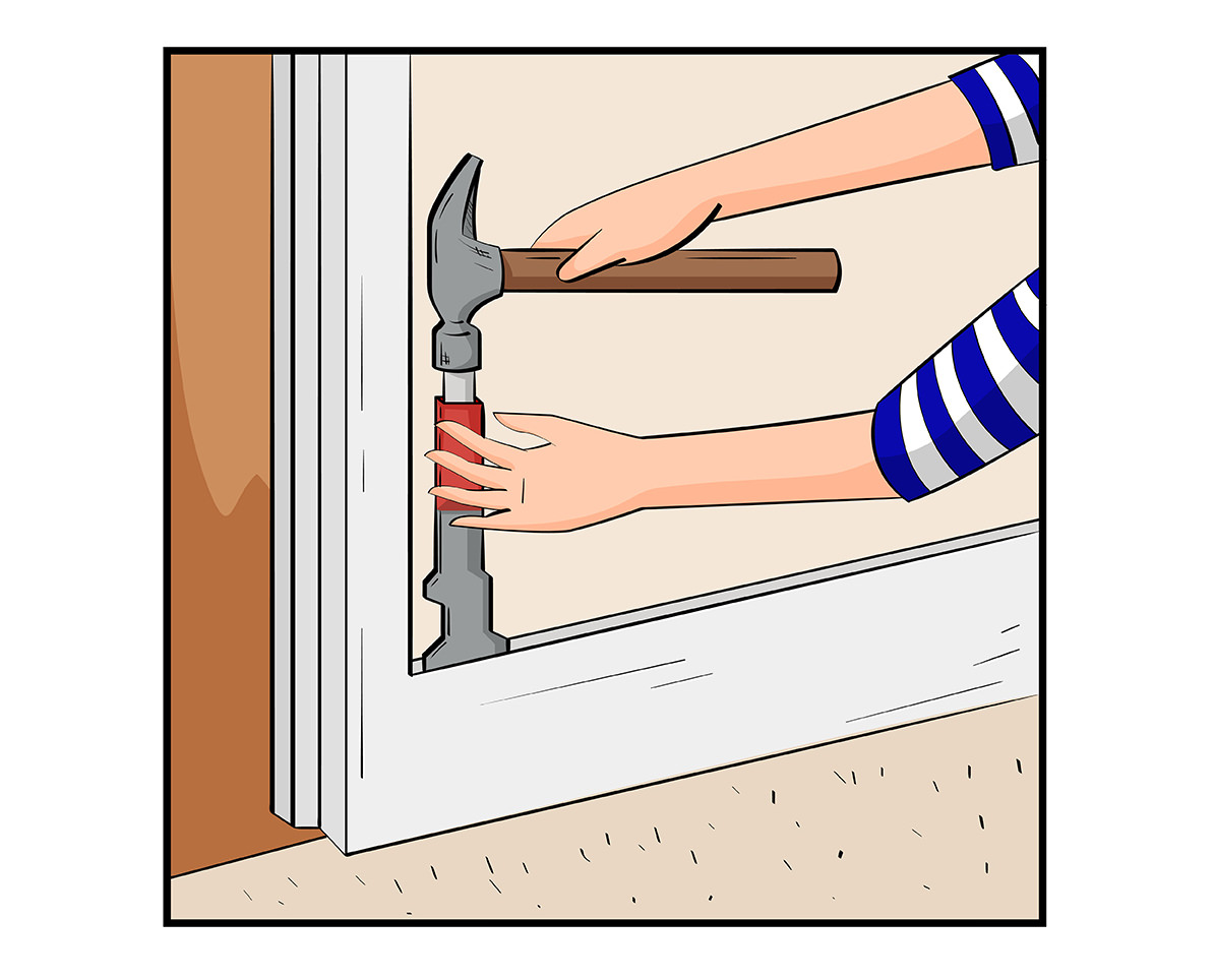 步骤3:一旦你撬开一些踢脚板从墙壁，插入你的撬杠爪端踢脚板和墙壁之间。重要的是，一定要在锤子和墙壁之间插入一英寸厚的木板。这样可以保护墙壁不受锤子压力的影响。
