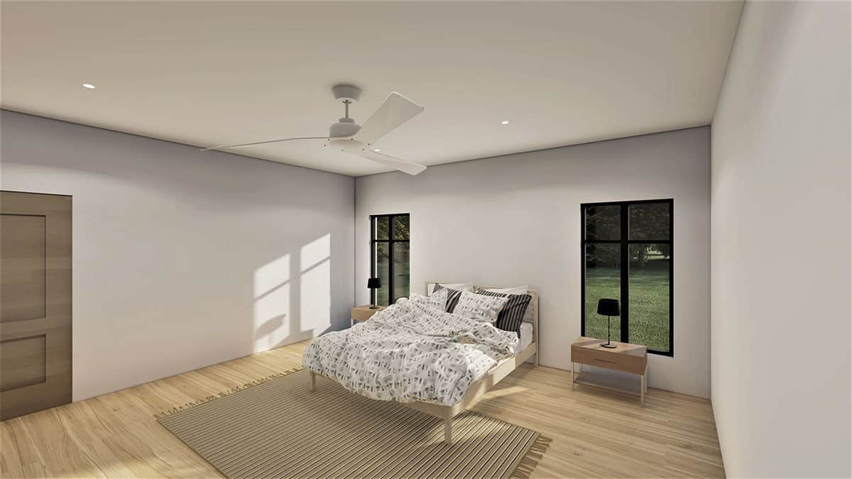 主卧室有一个舒服的木床,匹配的床头柜,流苏装饰地毯,躺在硬木地板上。
