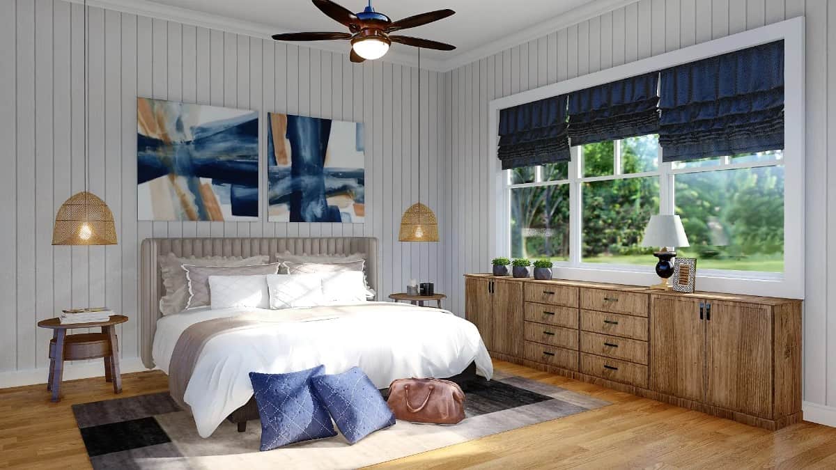 主卧室有一个木制梳妆台和一张定制的床，两侧有圆形床头柜和柳条吊坠。