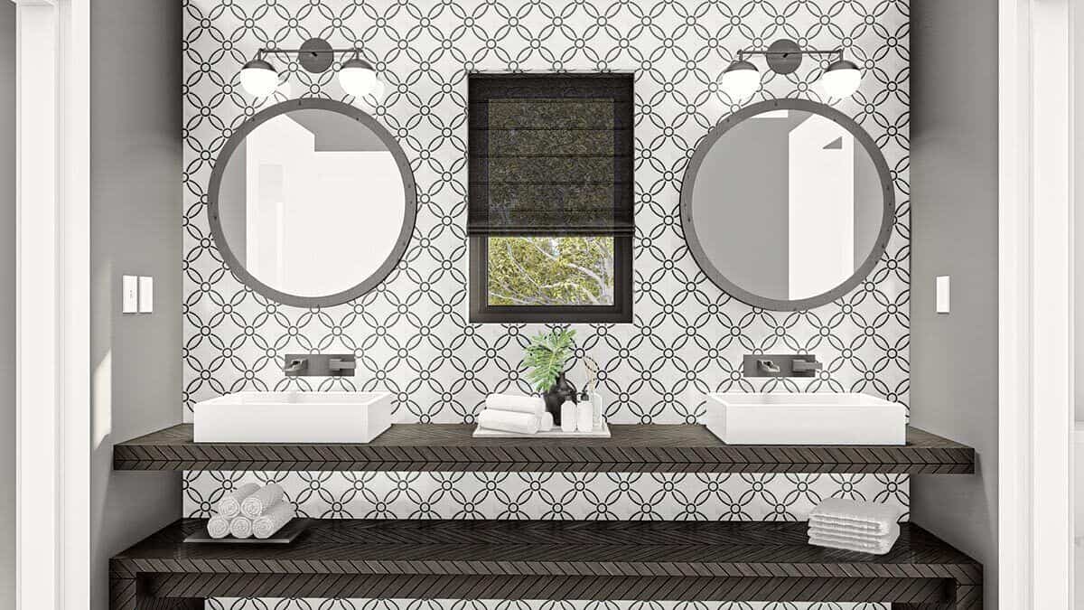 瓷砖墙为主浴室的双水槽梳妆台创造了一个很好的背景。