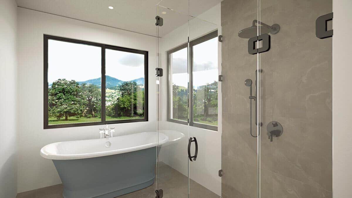 主浴室带步入式淋浴，独立浴缸，周围景观的美景。