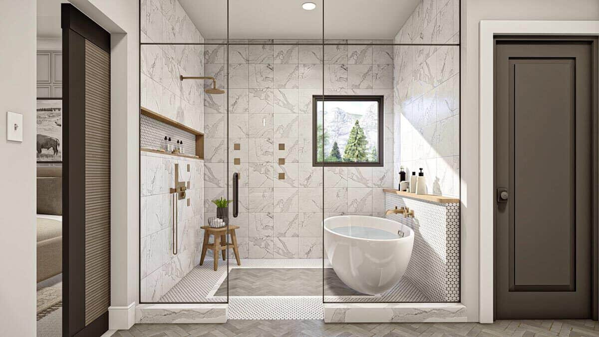 主浴室有一间配有黄铜固定装置的湿房、一个淋浴区和一个独立浴缸。