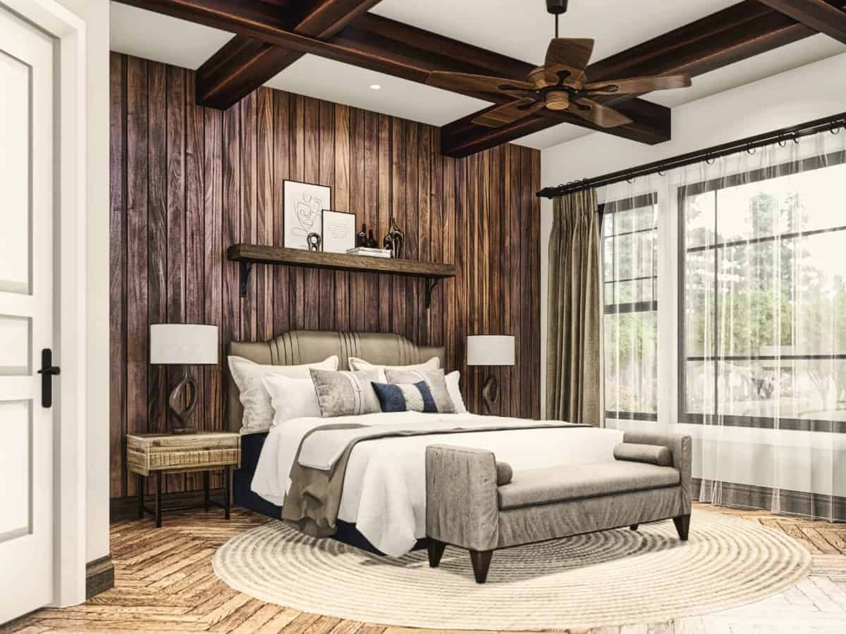 主卧室有一个方格天花板和硬木地板的口音混合,提高房间的舒适的氛围。