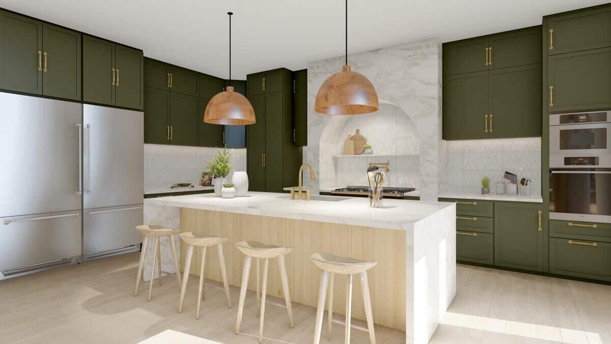 厨房里有橄榄绿的橱柜、不锈钢用具和一个瀑布岛，轻木底座与硬木地板融为一体。
