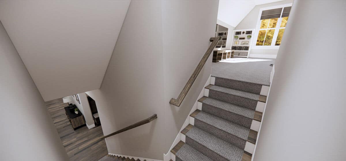 一条铺着灰色地毯的木楼梯通往楼上的奖励房。