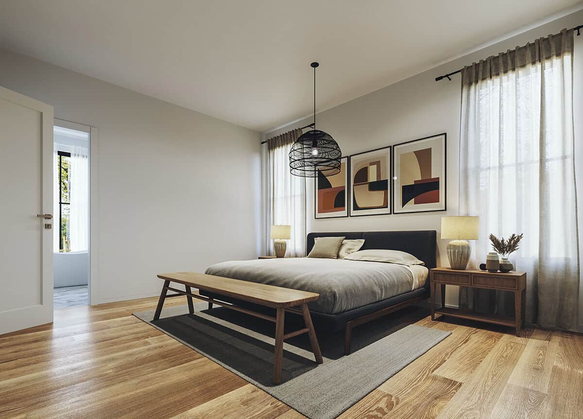 主卧室与抽象艺术作品和一个舒适的平台床补充板凳。